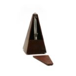 A Maelzel Paquet stained wooden pyramid metronome,