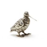 A small silver novelty pepperette,