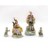 A Capo di Monti porcelain figure of a seated female reading,