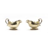 A pair of silver sauce boats,