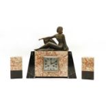 An Art Deco marble and spelter clock garniture,