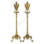 A pair of French Napoleon III Greek Revival gilt-bronze torchères,
