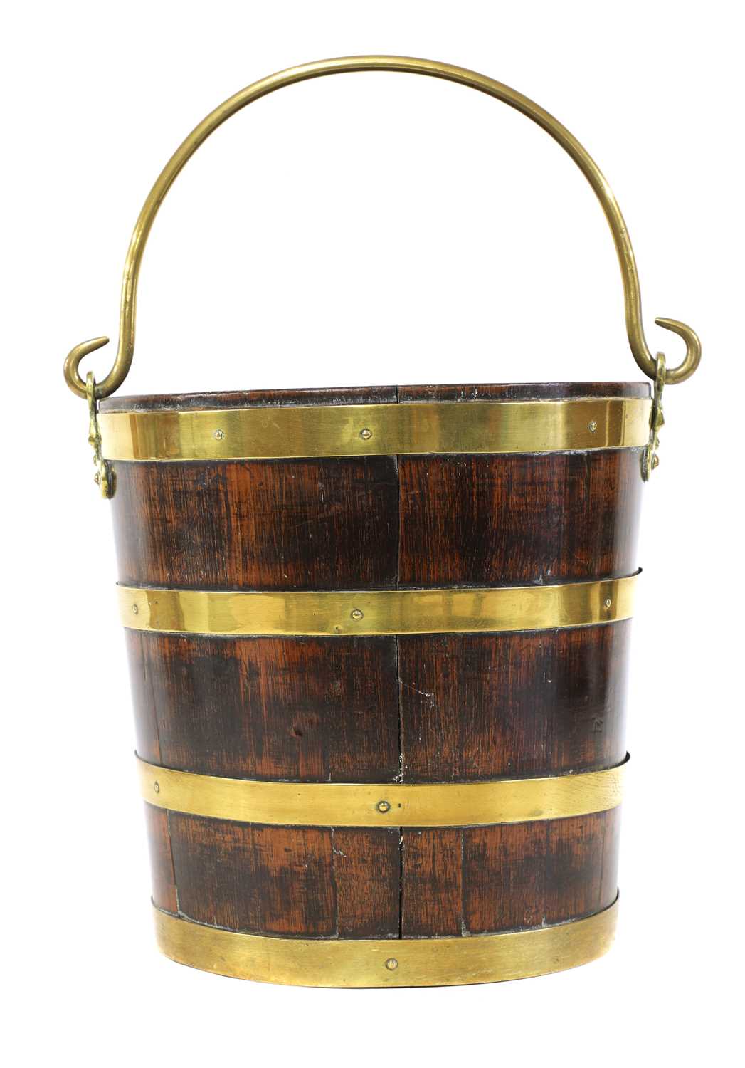 A George III mahogany and brass bound peat bucket,