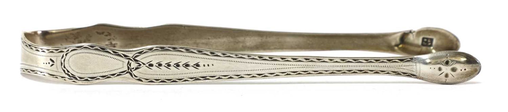 Eight pairs of silver sugar tongs, - Image 20 of 31