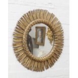 A Spanish giltwood sunburst wall mirror