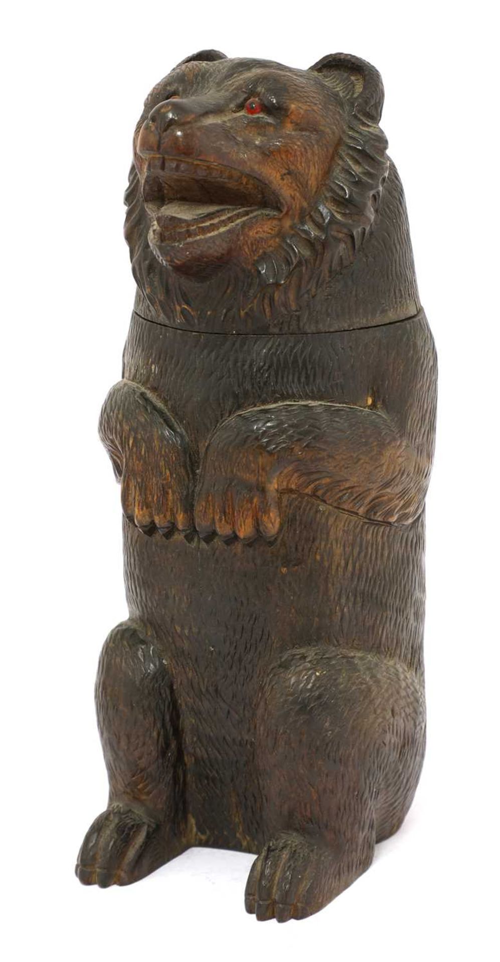 A Black Forest tobacco box in the form of a bear,