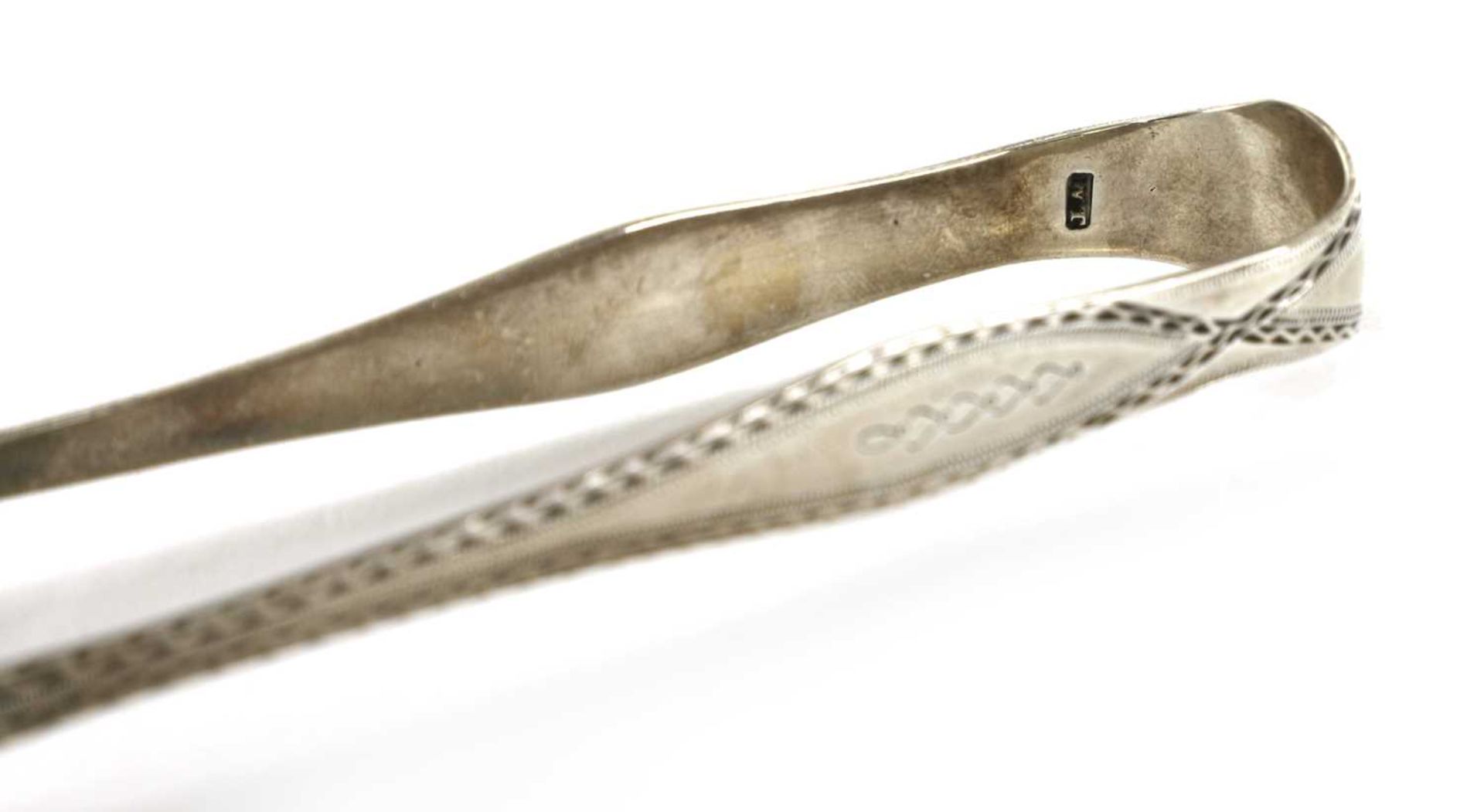 A pair of George III silver sugar tongs, - Image 12 of 33