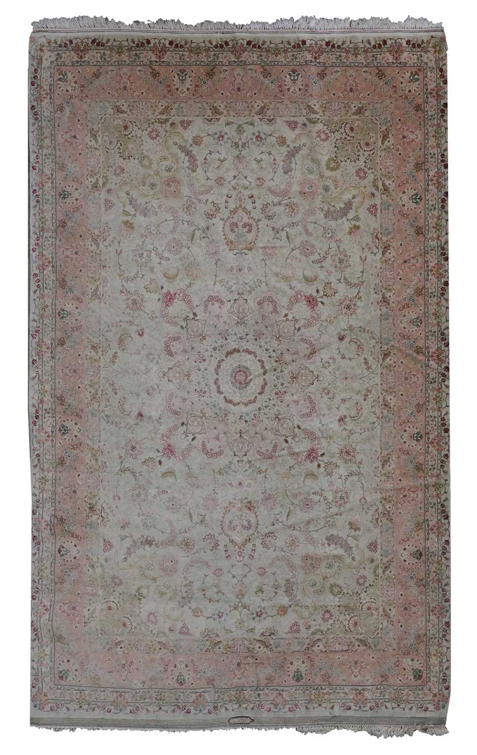 A Persian wool and silk Tabriz rug,