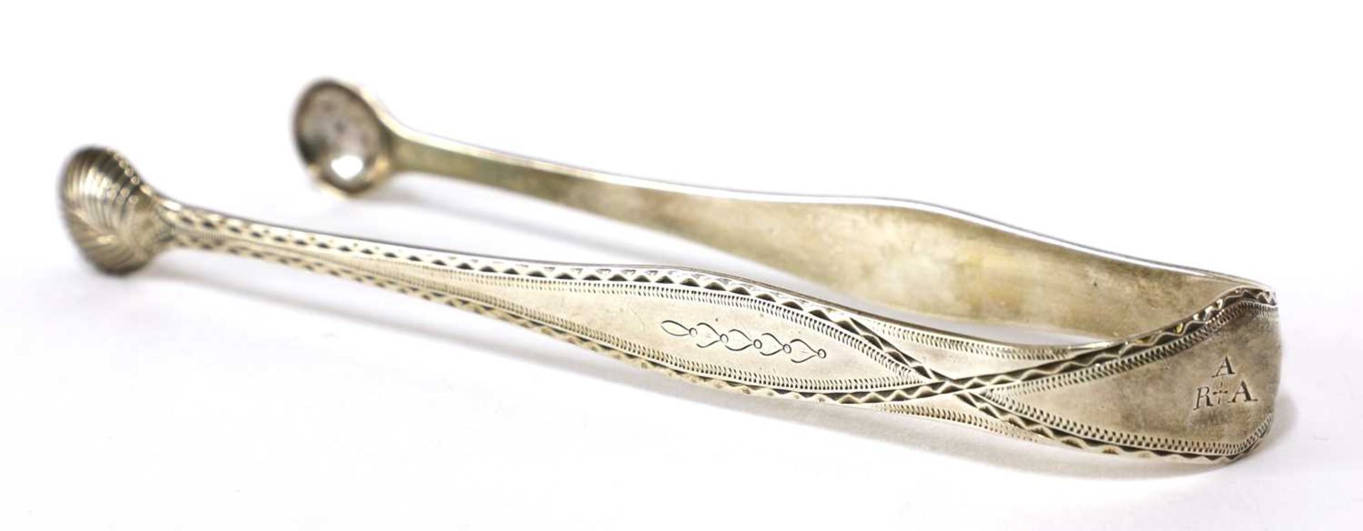 A pair of George III silver sugar tongs, - Image 11 of 33