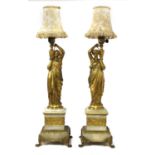 A pair of neoclassical ormolu table lamps,