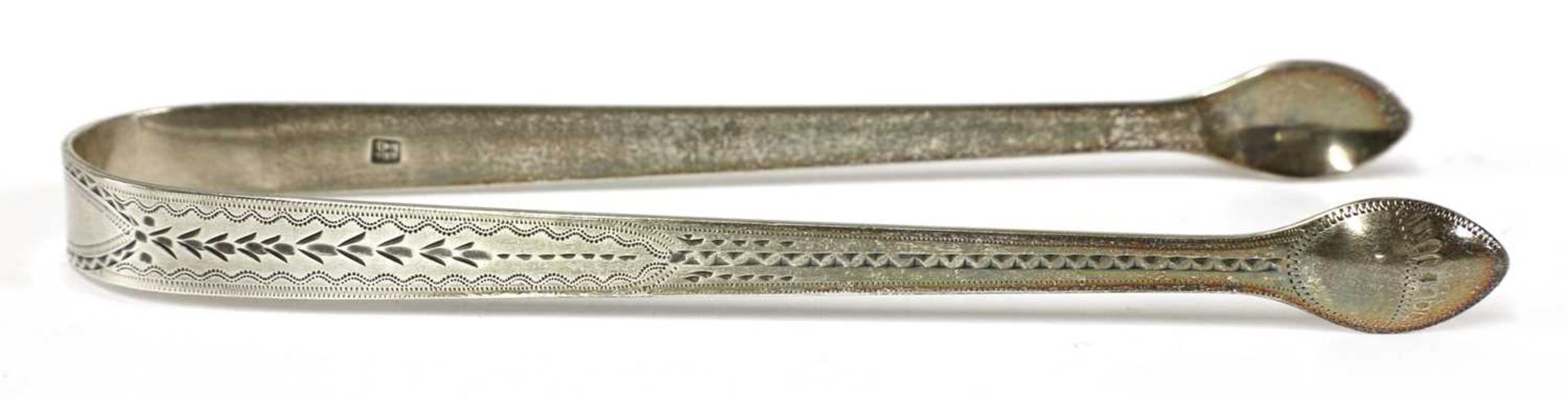 A pair of George III silver sugar tongs, - Image 2 of 33