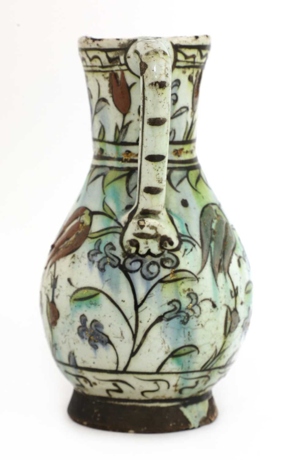 An Ottoman Iznik pottery jug, - Bild 3 aus 6