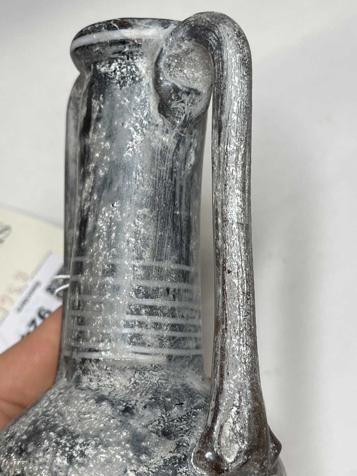A Roman marbled glass bottle, - Bild 43 aus 49