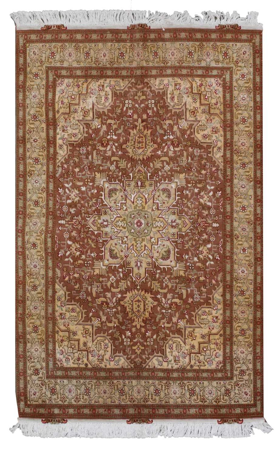 A fine Persian silk inlaid Tabriz rug,