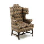 A William and Mary wingback armchair,