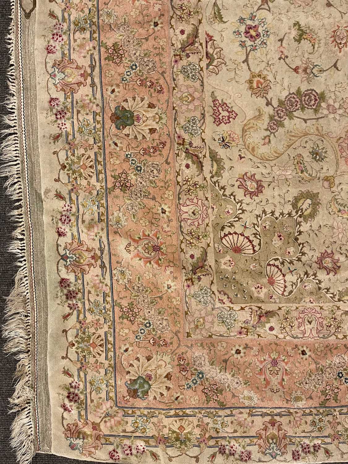A Persian wool and silk Tabriz rug, - Image 27 of 34