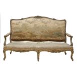 A Louis XV-style carved giltwood canape,