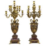A pair of marble, gilt and patinated bronze candelabra,
