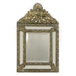 A Flemish brass mirror,