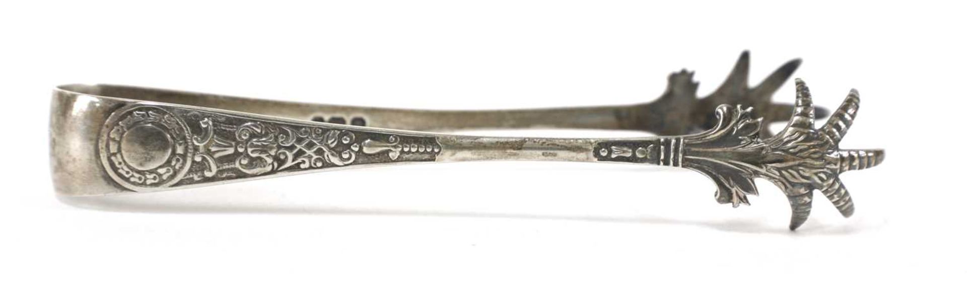 A pair of George III silver sugar tongs, - Image 23 of 28