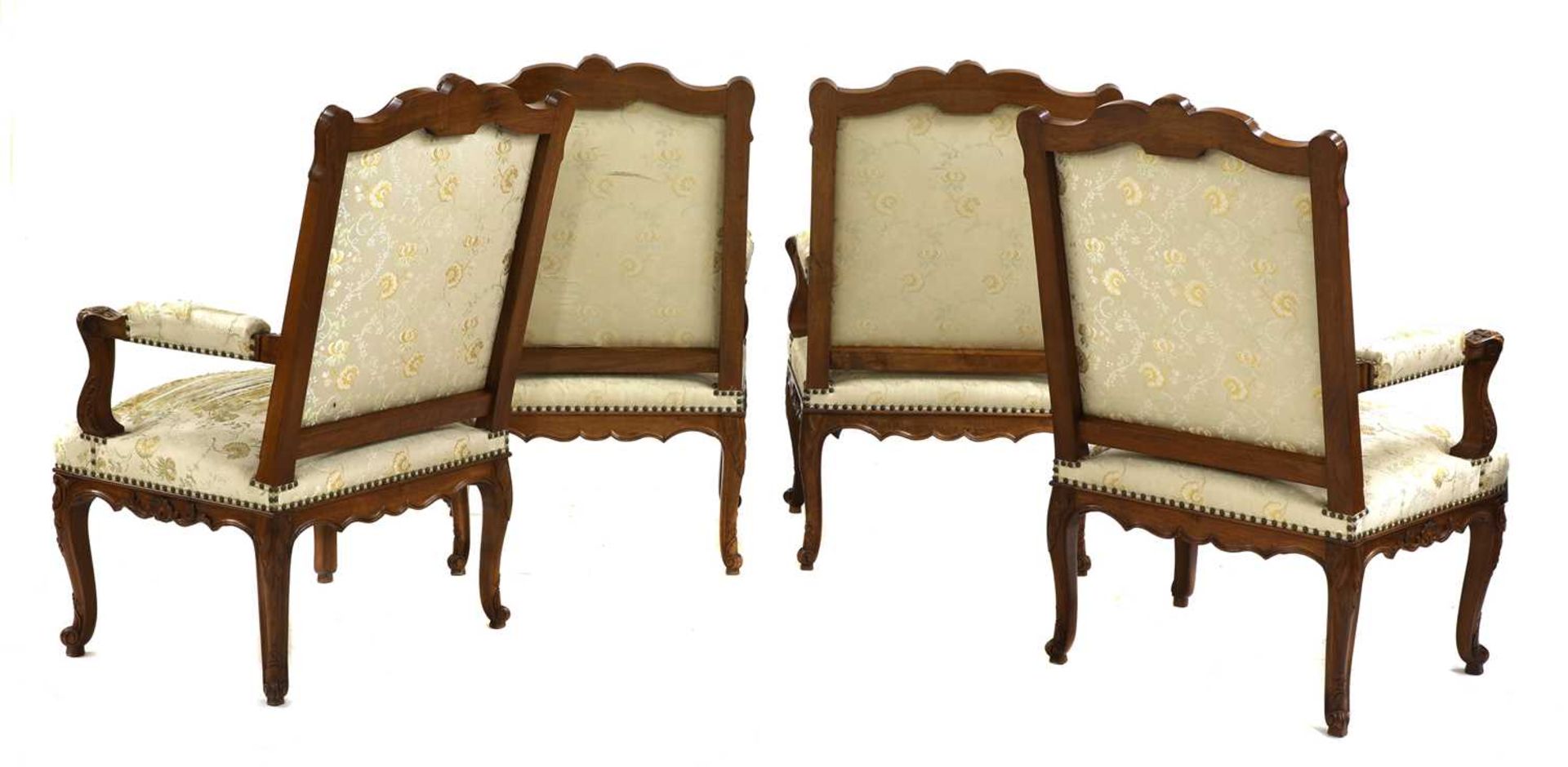 A set of four French Regency-style walnut elbow chairs, - Image 5 of 5