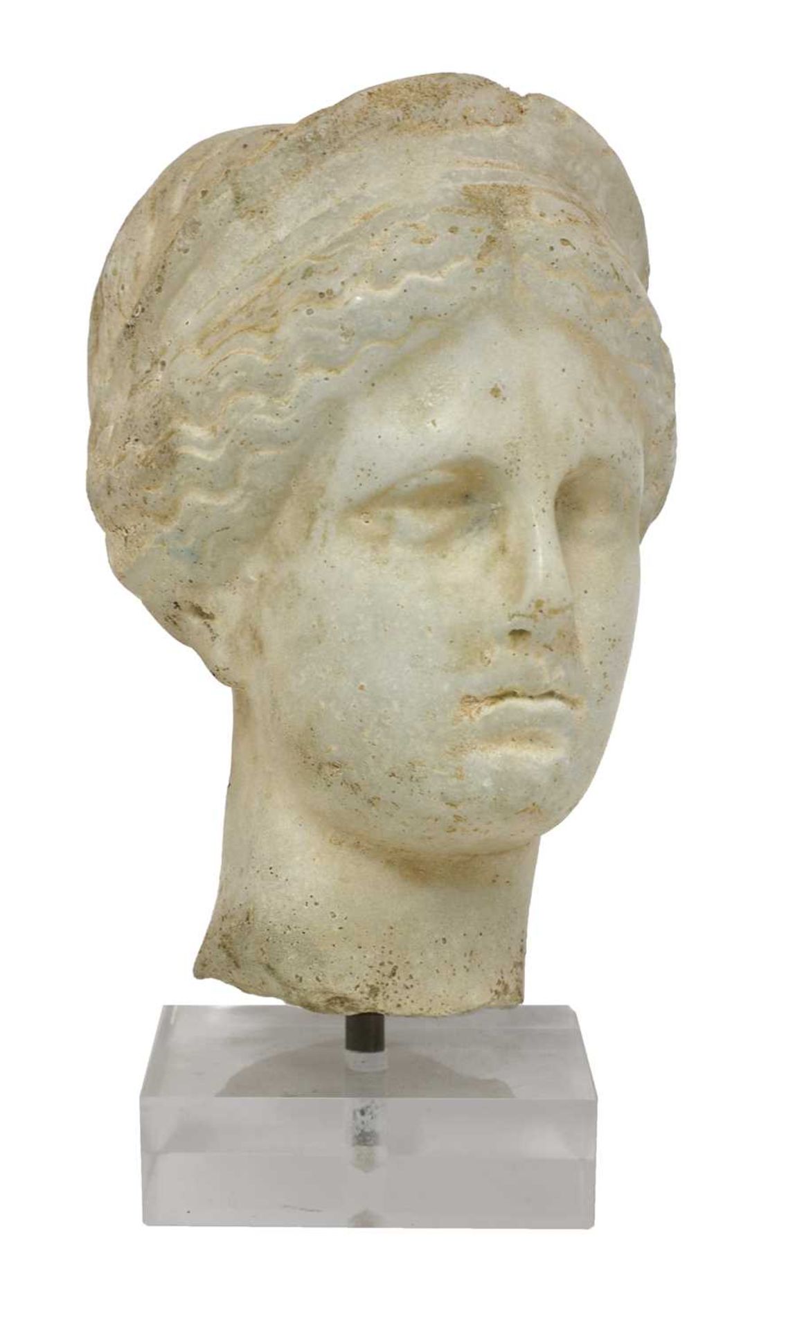A grand tour carved marble or limestone head of Diana,