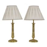 A pair of French Empire-style ormolu table lamps,