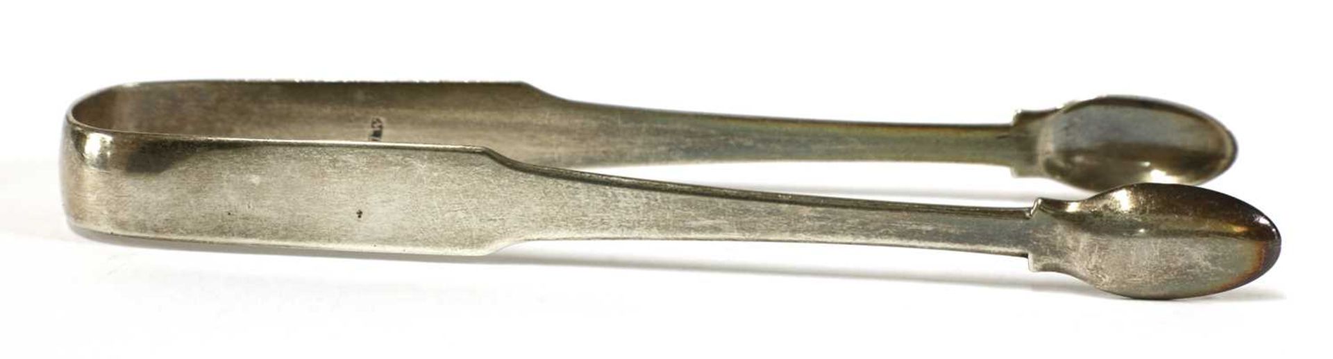 A pair of George III silver sugar tongs, - Image 30 of 33