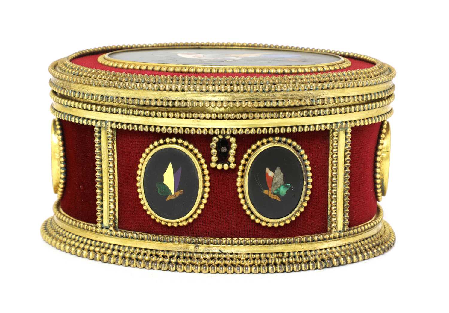 An oval gilt-metal and pietra dura inset casket, by Tahan, Paris,