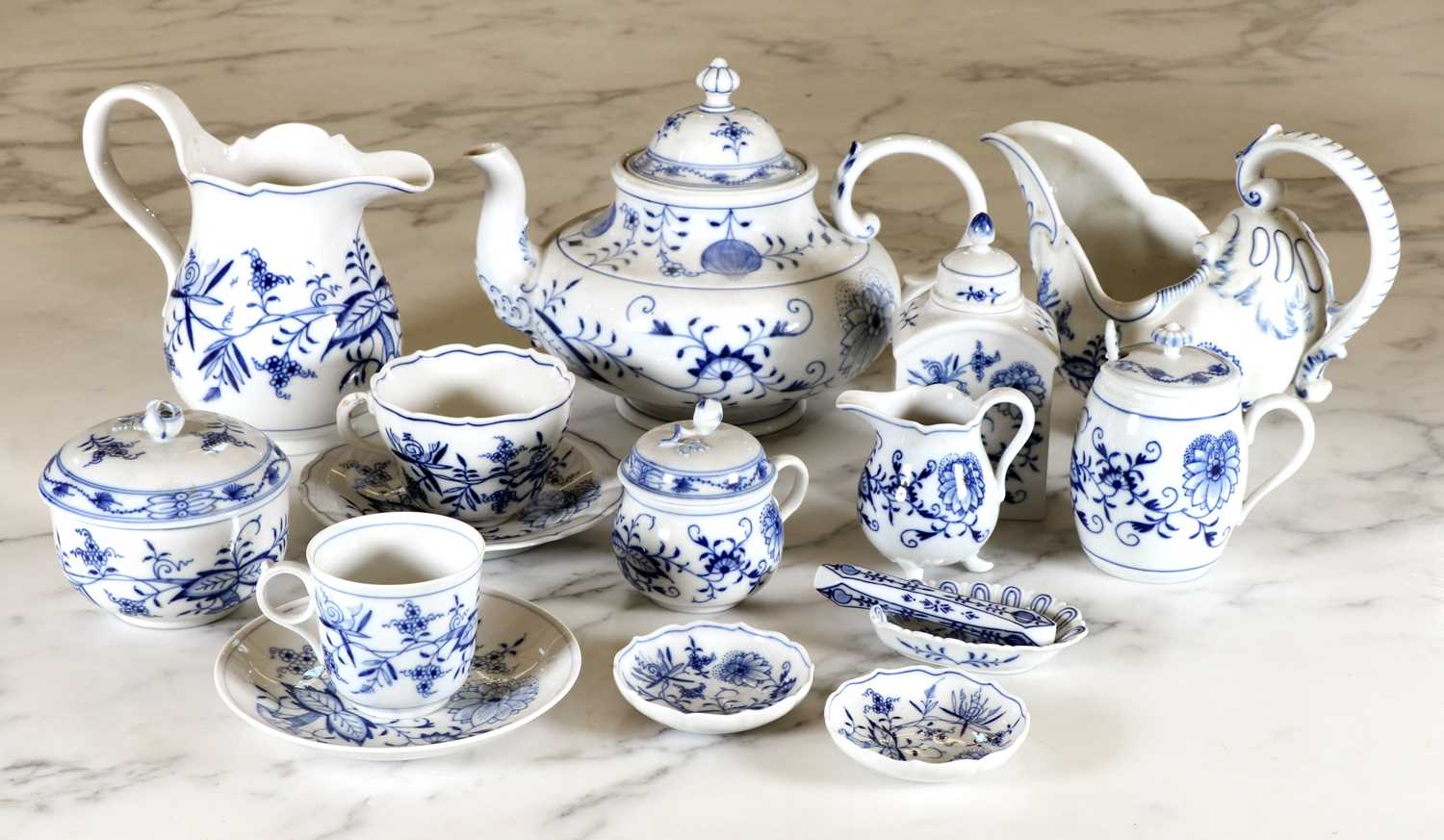 An extensive Meissen Onion pattern blue and white dinner and tea service,