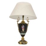 A French pottery and gilt metal table lamp and shade,
