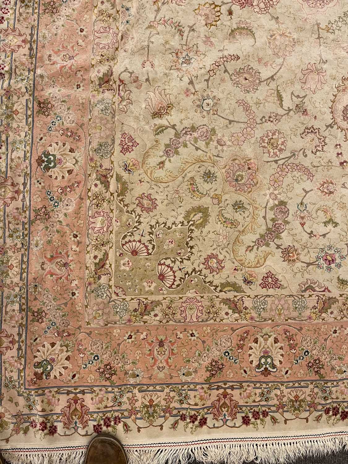 A Persian wool and silk Tabriz rug, - Image 34 of 34