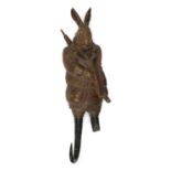 A Black forest carved linden wood and horn musical hook,