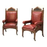 A pair of large Victorian oak Gothic throne chairs,