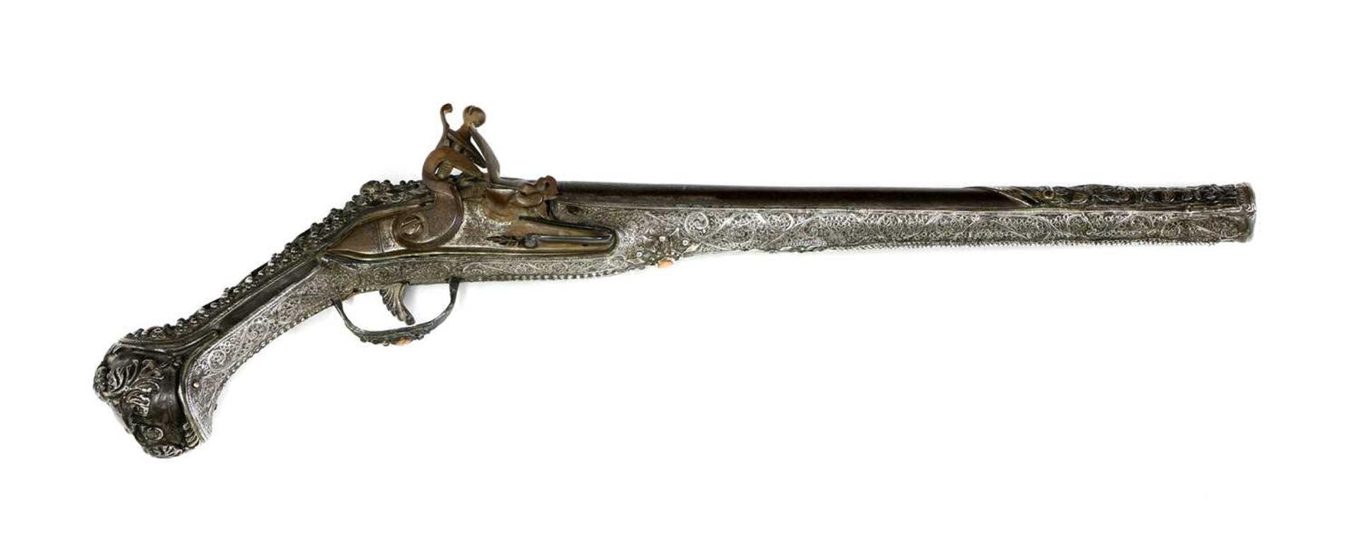 A Turkish silver-mounted flintlock pistol,