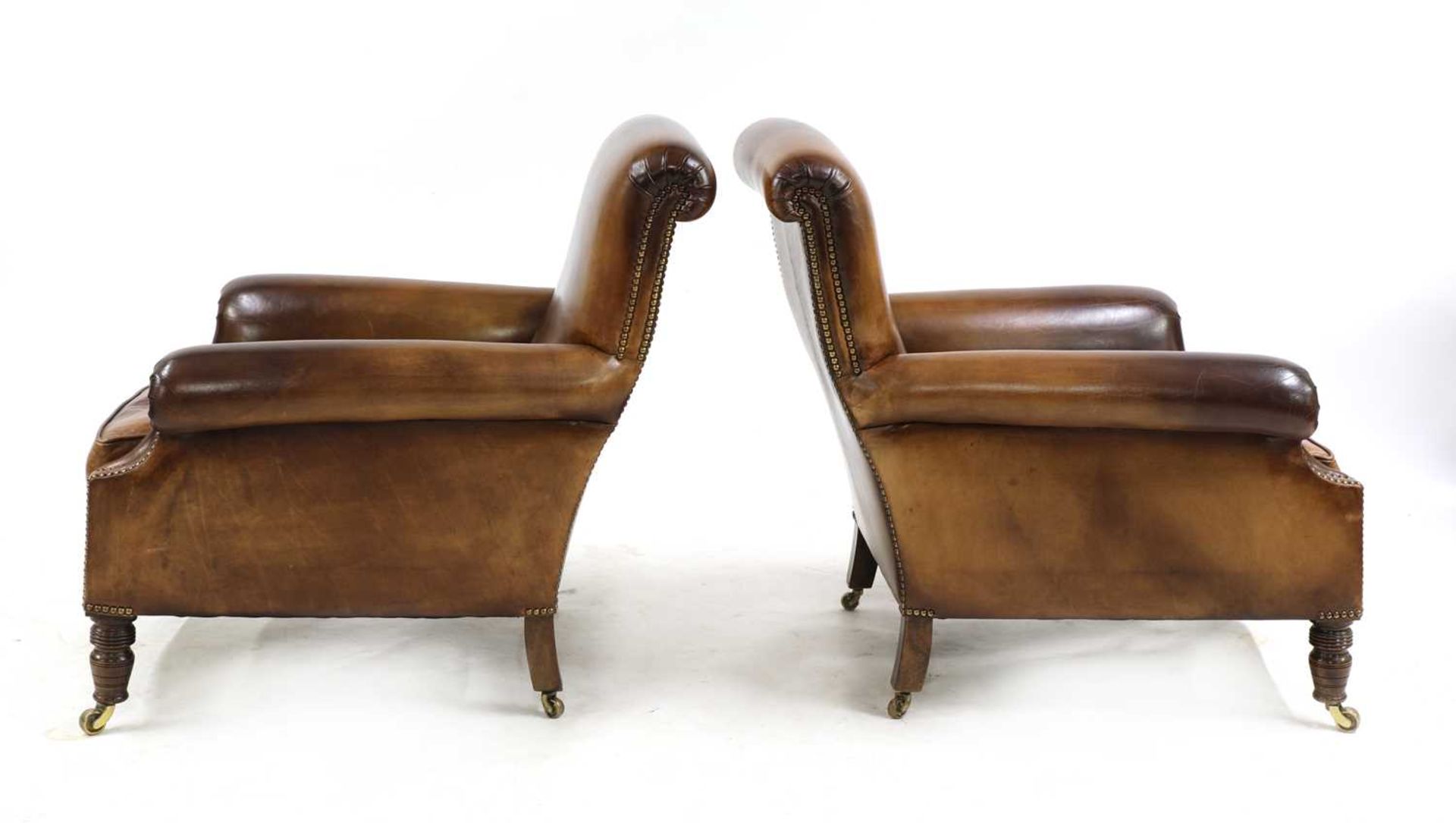 A pair of club chairs,