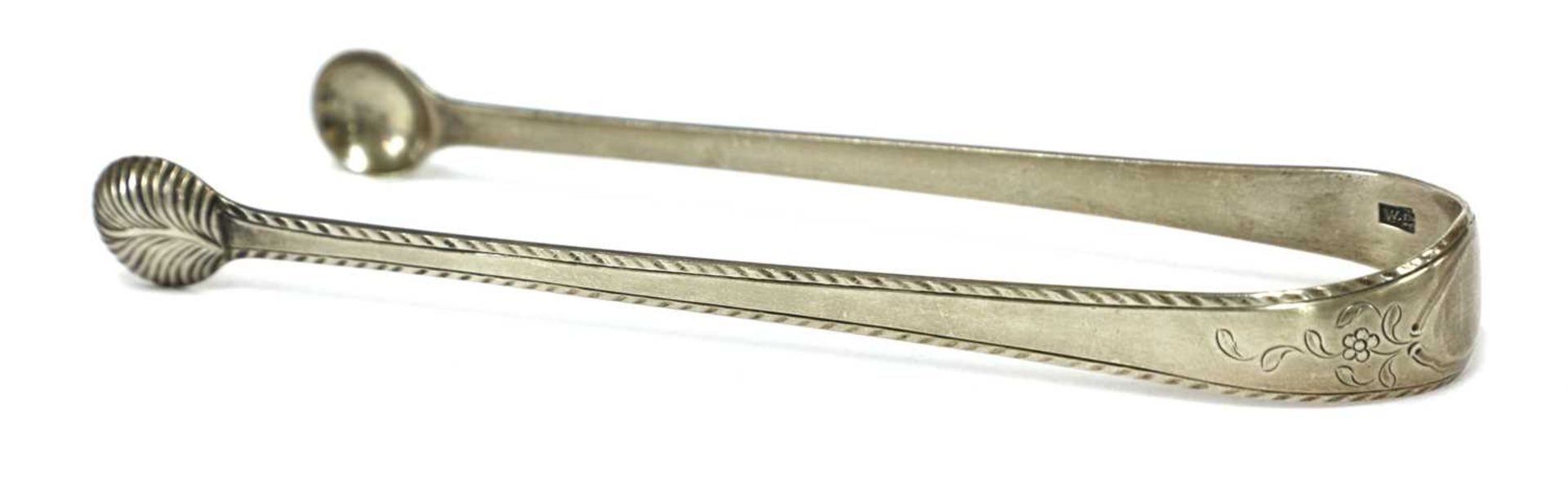A pair of George III silver sugar tongs, - Image 17 of 28