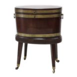 A George lll oval mahogany wine cooler,