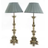 A matched pair of Dutch-style brass altar candlestick table lamps