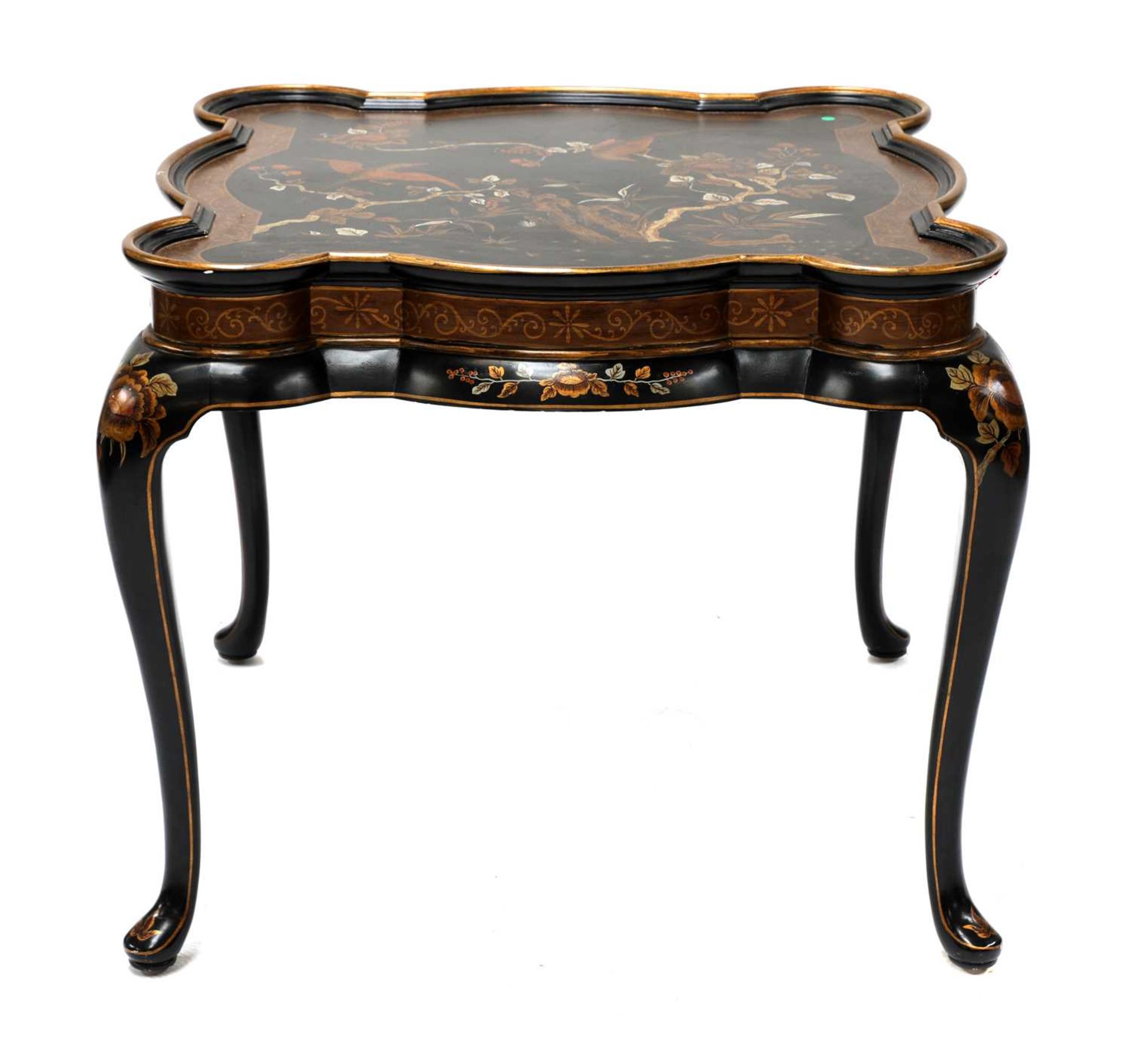 An ebonised and painted chinoiserie low table,