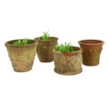 Four various terracotta garden urns,