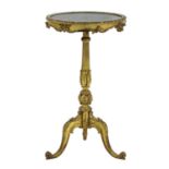 A carved giltwood tripod table,