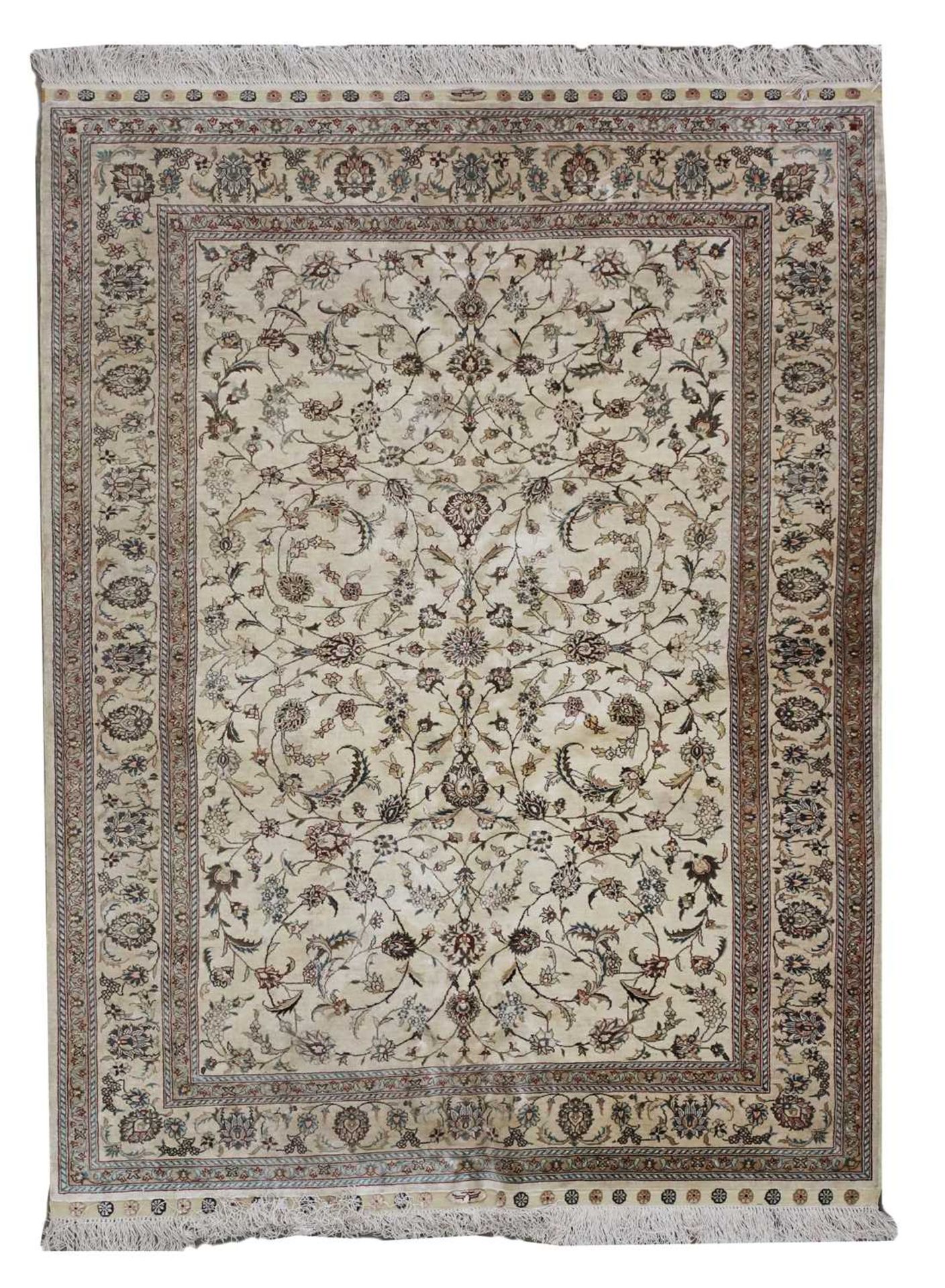 A Persian wool and silk Tabriz rug,