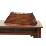 A Regency brass inlaid rosewood plinth,