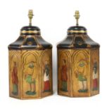 A pair of painted and gilded table lamps,