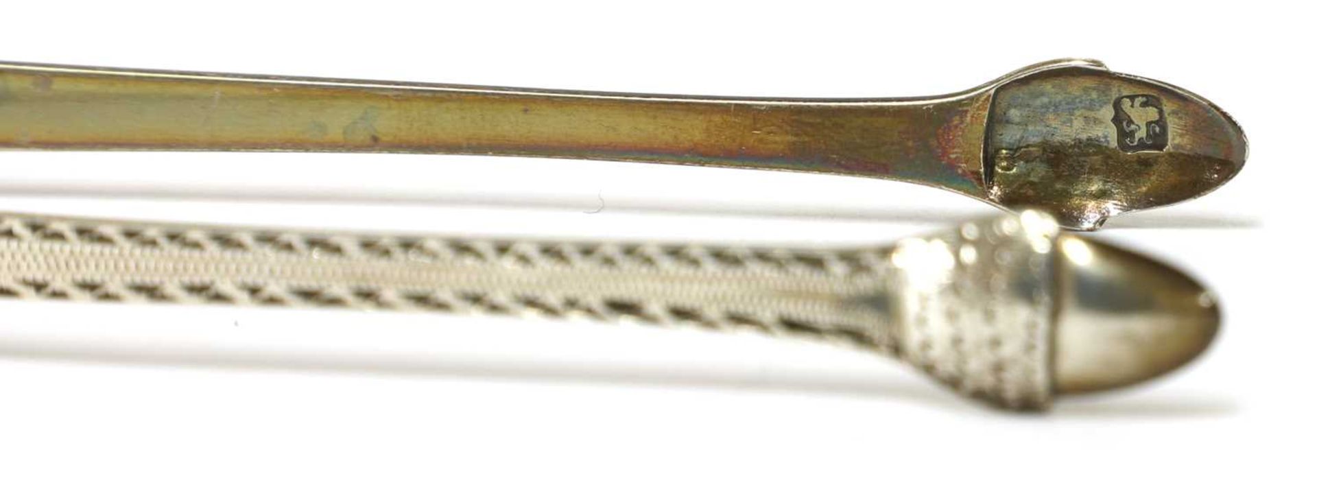 A pair of George III silver sugar tongs, - Image 21 of 33