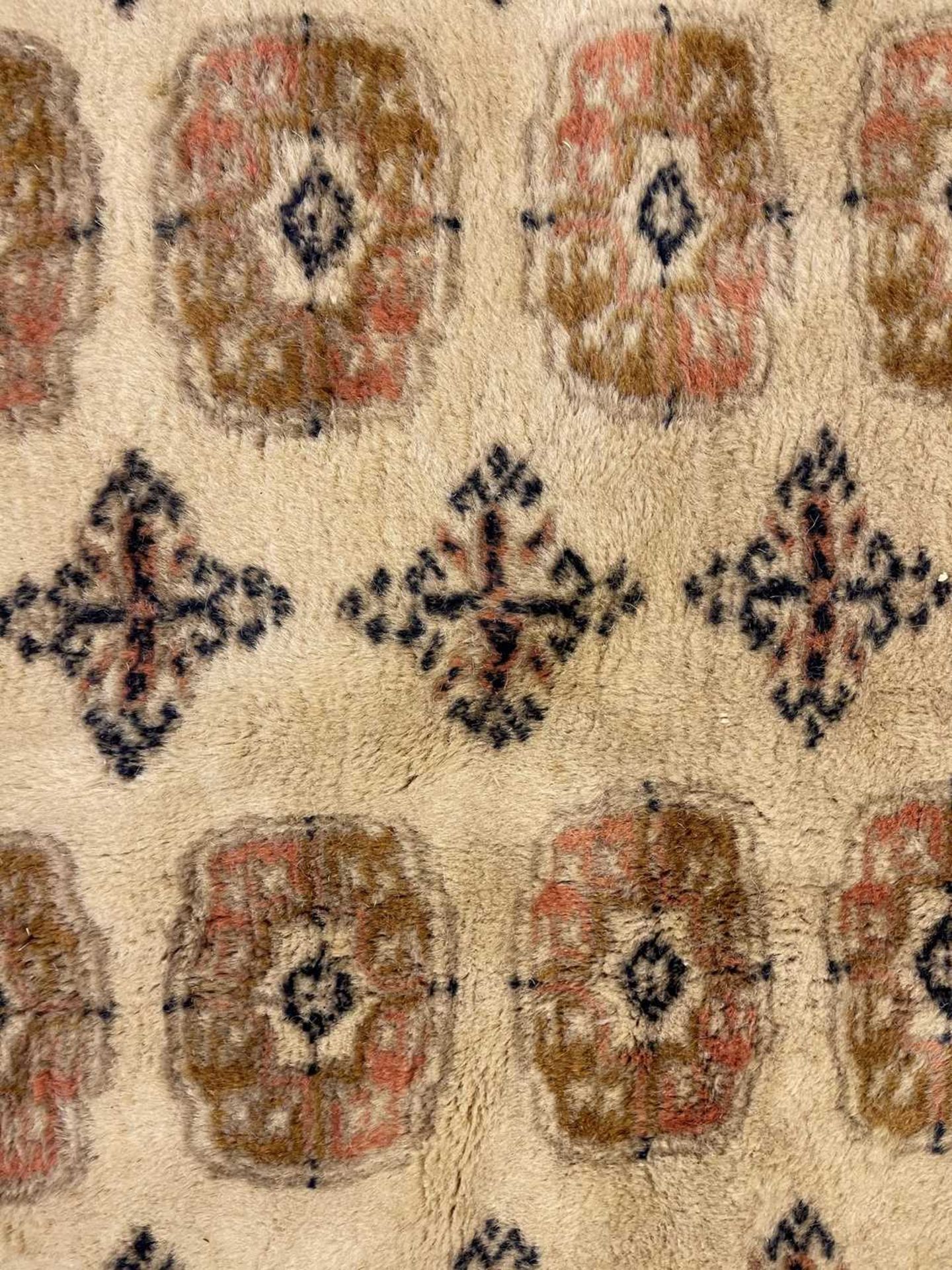A Bokhara design carpet, - Image 3 of 13
