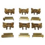 A set of six gilt bronze Ionic column bases and capitals,