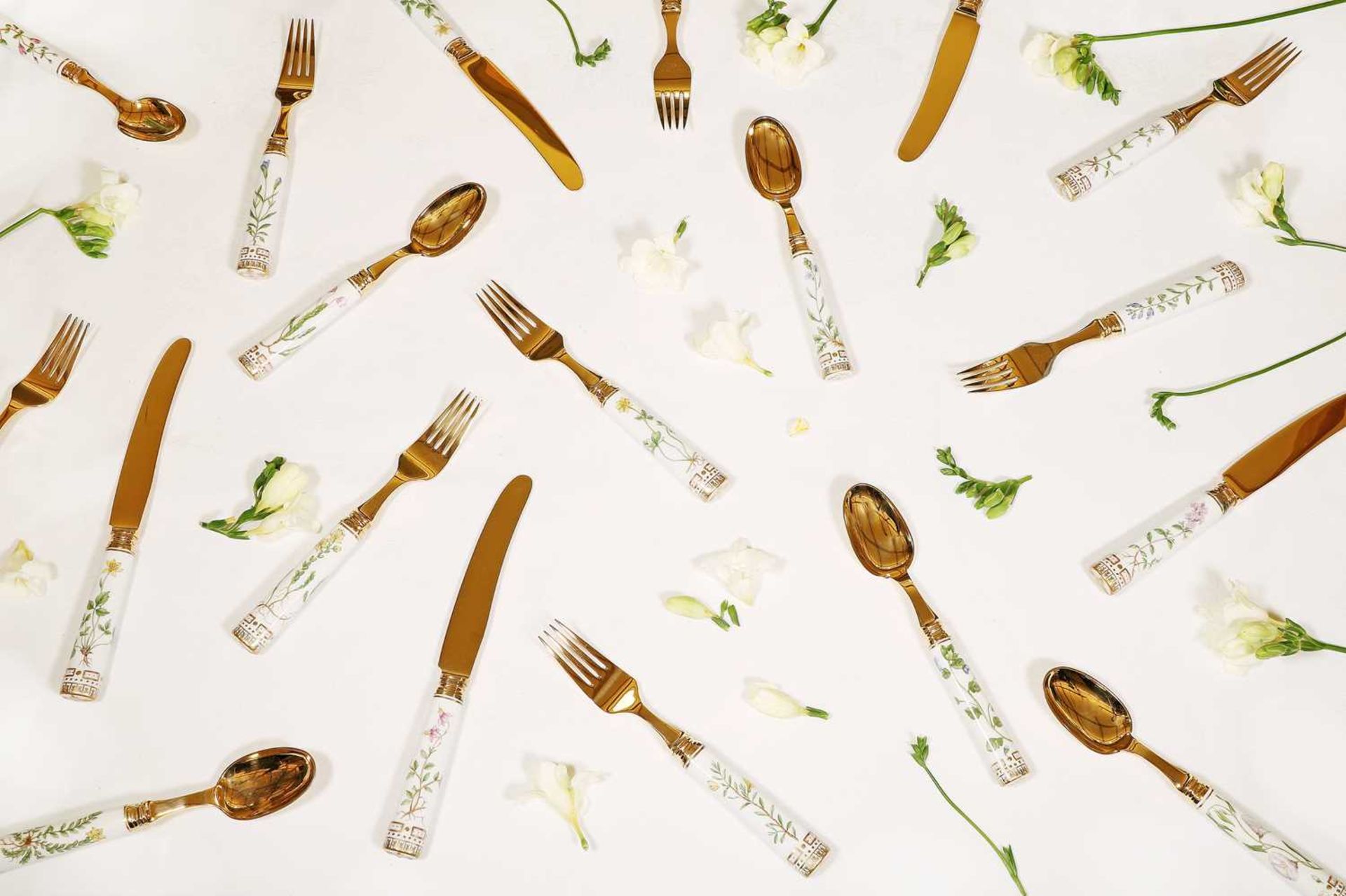 A part canteen of Royal Copenhagen 'Flora Danica' porcelain and silver-gilt cutlery,