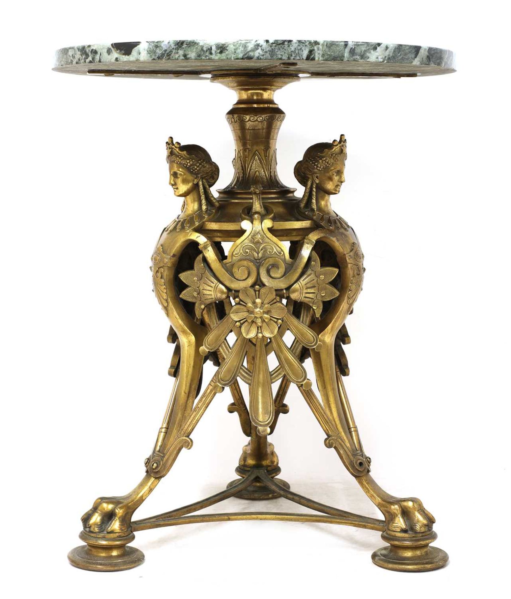 A French Napoleon III gilt-metal occasional table,